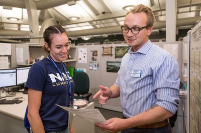 A student talking to an advisor.